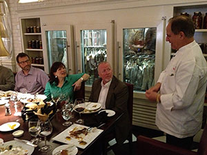 Jonathan Crossland from Illes Seasonings listening to Chef John Folse at Restaurant R’evolution